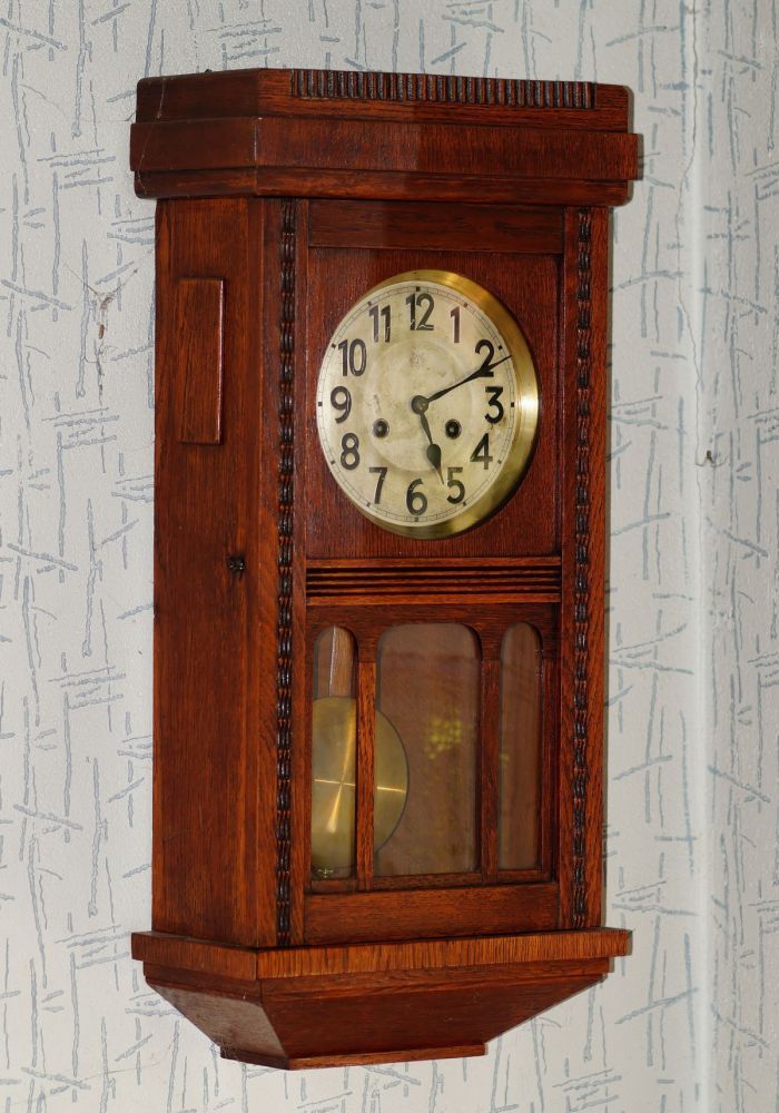 wallclockantiquewoodeastfrisianclockclockfacevaluablependulenostalgic-939203